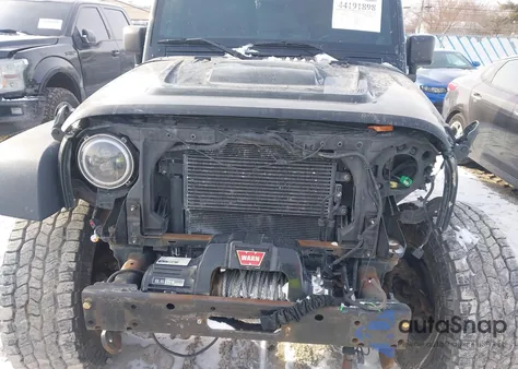 2013 Jeep Wrangler Unlimited Moab z USA, uszkodzony, nr VIN 1C4HJWEGXDL564607